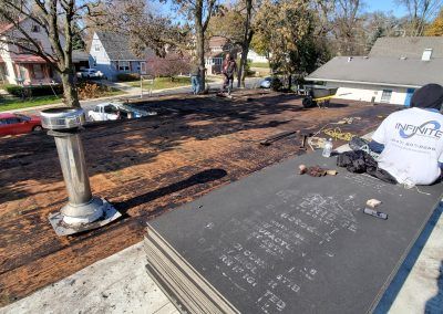 Replace Elgin Flat Roof deck replacement